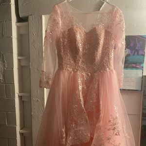 Only been worn once to try on .Sizes 8-10 adjustable through corset